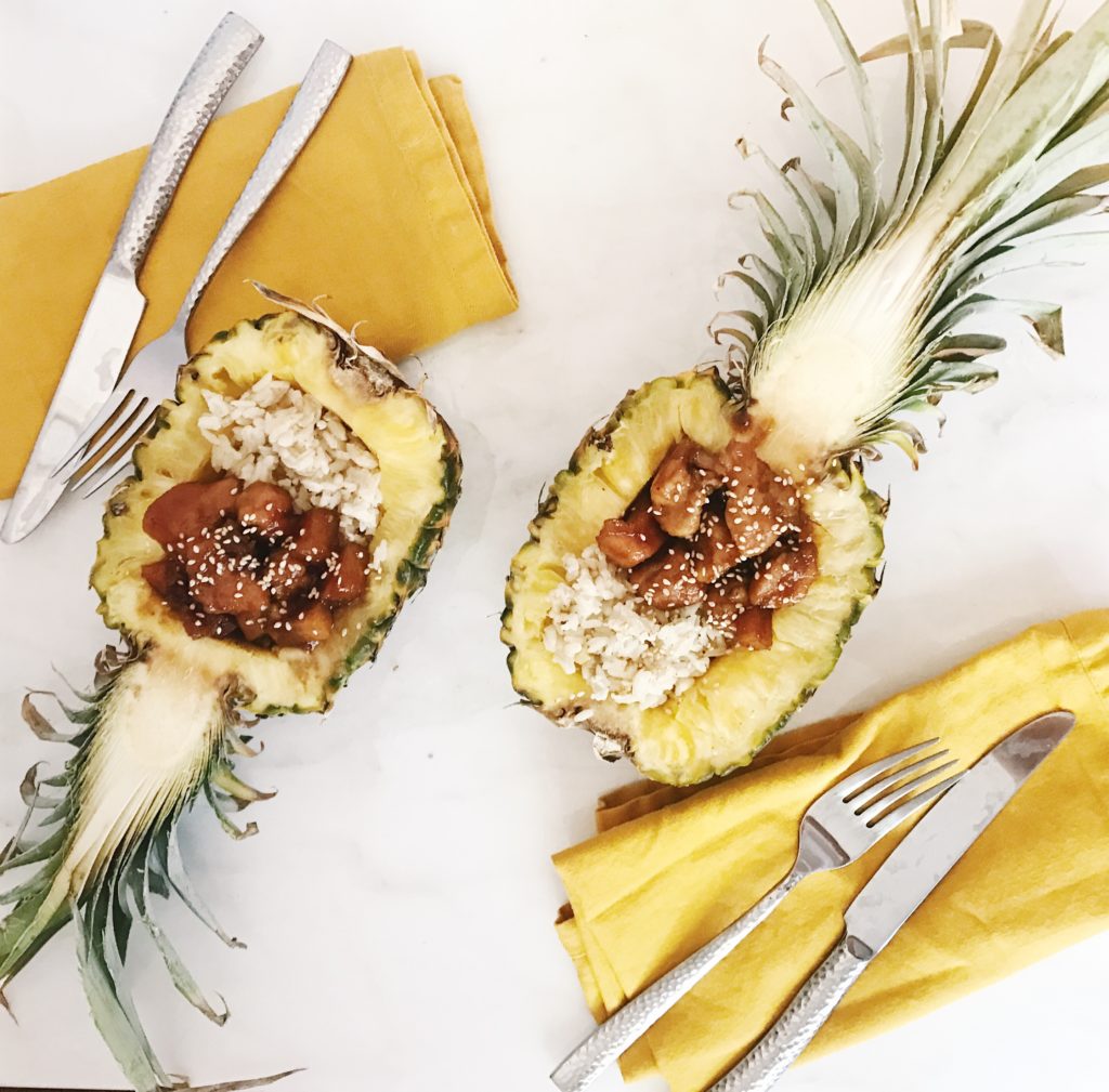 best pineapple chicken and coconut rice recipe made in a pineapple boat