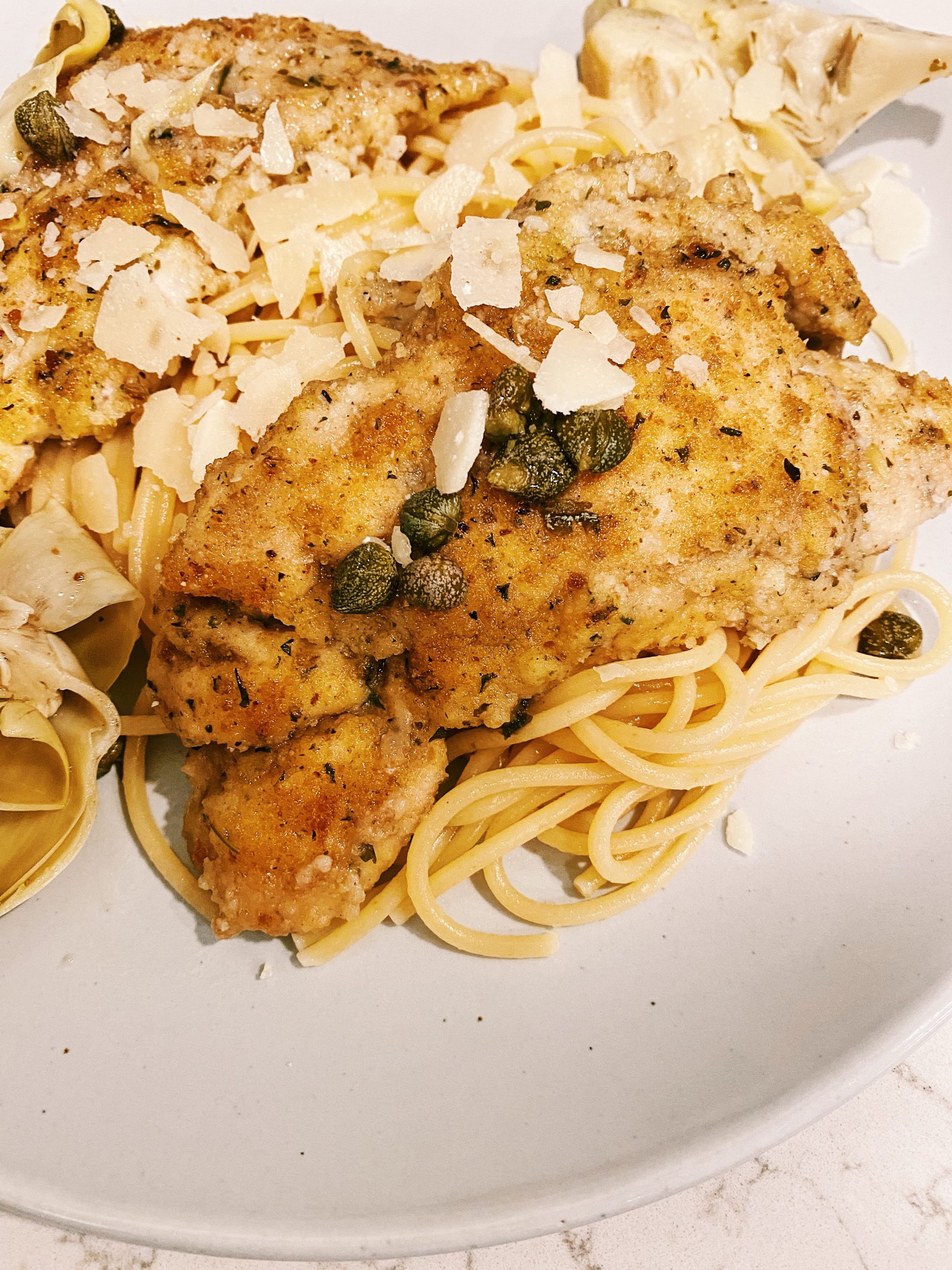 How to Make Chicken Piccata with Artichokes and Capers